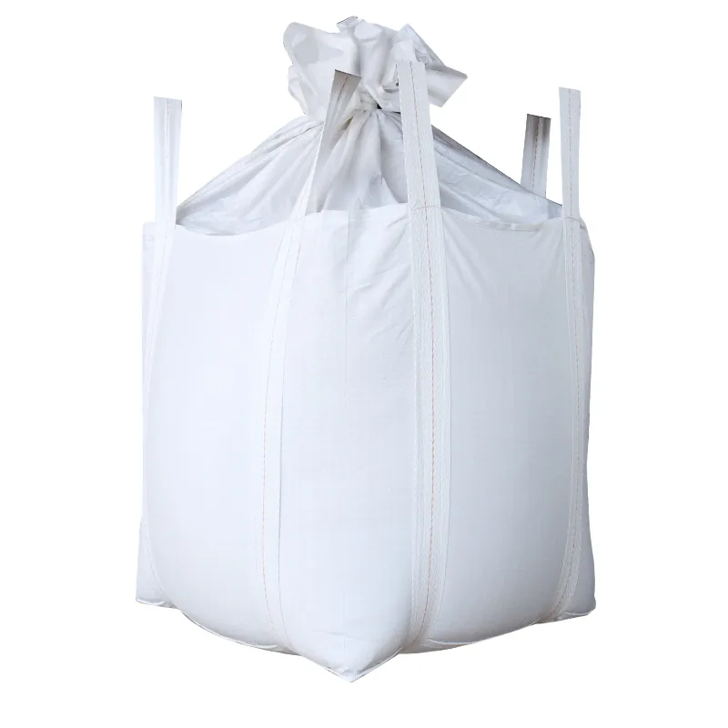 FIBC bulk bag with filling spout and discharge duffle top